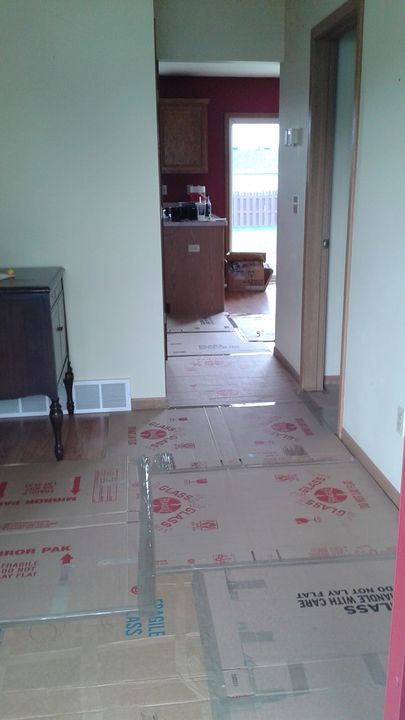 Floor protection laid down in a home entryway (Full Service Moving) by Moving Pros CLE