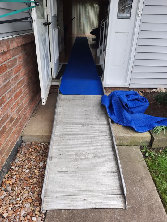 Ramp and floor runner set up at a home entrance (Full Service Moving) by Moving Pros CLE