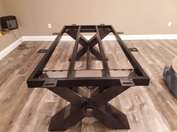 Pool table base frame being reassembled (Pool Table Moving Services) by Moving Pros CLE